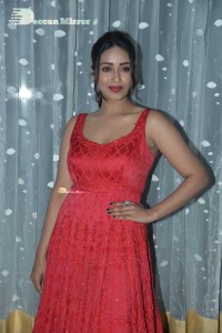 Actress Nivetha Pethuraj glamorous in a Red Dress attending the pre release function of movie Paagal