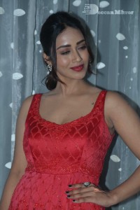 Actress Nivetha Pethuraj glamorous in a Red Dress attending the pre release function of movie Paagal