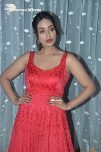 Actress Nivetha Pethuraj glamorous in a Red Dress attending the pre release function of movie Paagal