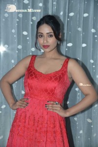 Actress Nivetha Pethuraj glamorous in a Red Dress attending the pre release function of movie Paagal