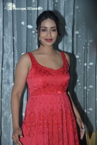 Actress Nivetha Pethuraj glamorous in a Red Dress attending the pre release function of movie Paagal