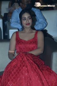 Actress Nivetha Pethuraj glamorous in a Red Dress attending the pre release function of movie Paagal