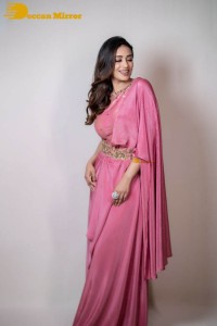 Actress Nivetha Pethuraj in a pink saree