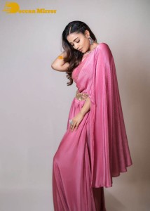 Actress Nivetha Pethuraj in a pink saree