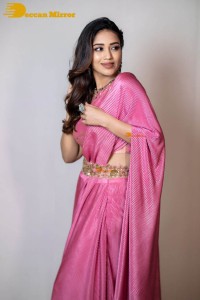 Actress Nivetha Pethuraj in a pink saree