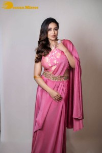 Actress Nivetha Pethuraj in a pink saree