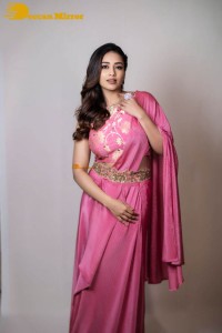Actress Nivetha Pethuraj in a pink saree