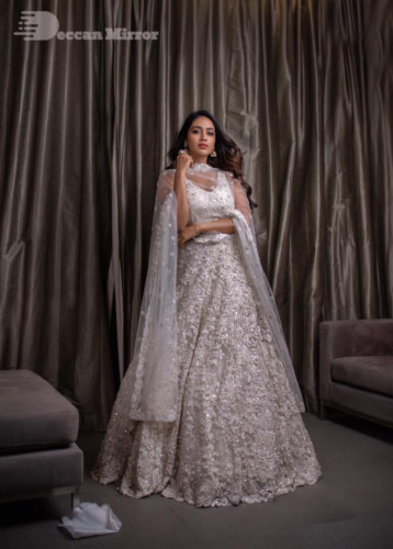 Tamil and Telugu Actress Nivetha Pethuraj is seen in a white dress in this photoshoot