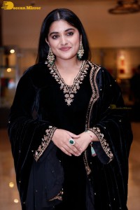 Nivetha Thomas attending a movie function dressed in black