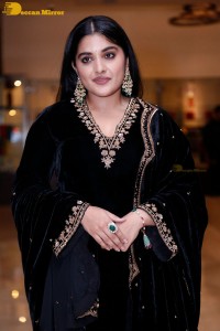 Nivetha Thomas attending a movie function dressed in black
