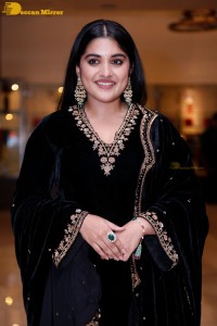 Nivetha Thomas attending a movie function dressed in black