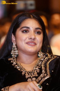 Nivetha Thomas attending a movie function dressed in black