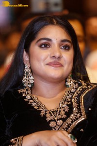 Nivetha Thomas attending a movie function dressed in black