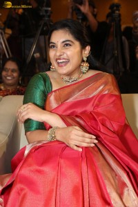 actress Nivetha Thomas gorgeous in a red saree at a movie event