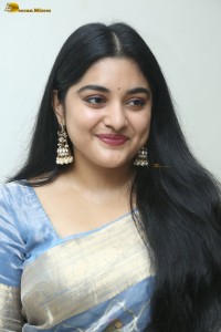 actress Nivetha Thomas pretty in a blue saree
