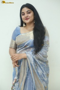 actress Nivetha Thomas pretty in a blue saree