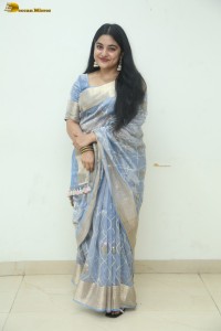 actress Nivetha Thomas pretty in a blue saree