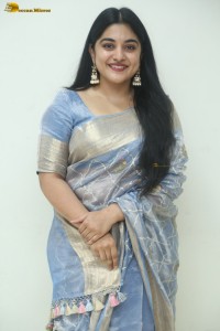actress Nivetha Thomas pretty in a blue saree