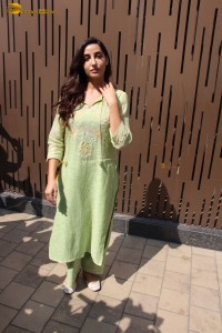 actress nora fatehi in a green salwar kameez
