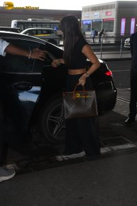 bollywood actress Nora Fatehi gorgeous in a black dress