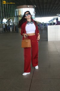 bollywood actress nora fatehi in stylish attire at airport