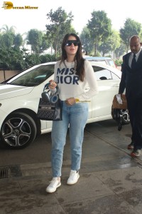 actress Nora Fatehi in a stylish look at mumbai airport
