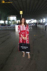 actress nupur sanon sweet looks in a red salwar dress