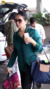 actress Padmini Kolhapure cute in a green shirt