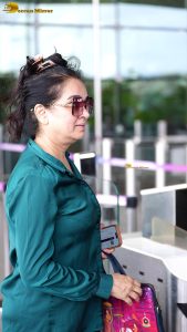 actress Padmini Kolhapure cute in a green shirt