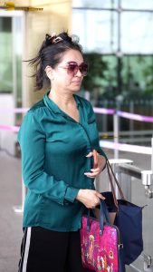 actress Padmini Kolhapure cute in a green shirt