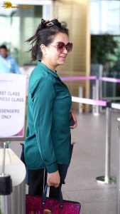 actress Padmini Kolhapure cute in a green shirt