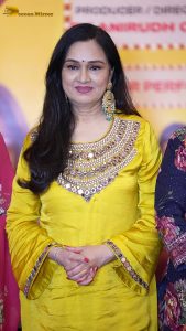 actress Padmini Kolhapure pretty in a yellow dress