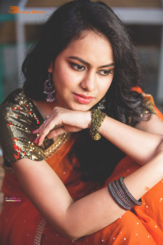 Telugu Actress Pallavi Dora Photoshoot in a orange saree