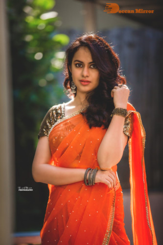 Telugu Actress Pallavi Dora Photoshoot in a orange saree
