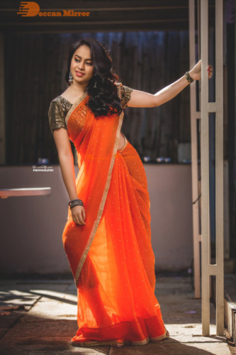 Telugu Actress Pallavi Dora Photoshoot in a orange saree