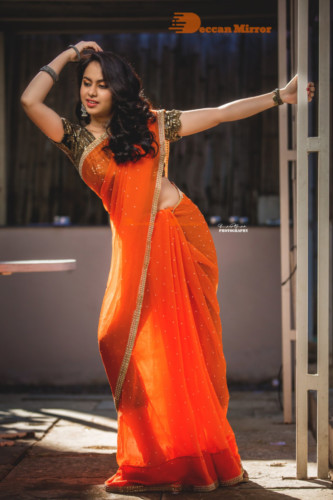 Telugu Actress Pallavi Dora Photoshoot in a orange saree