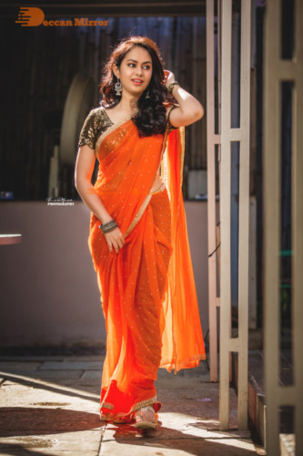 Telugu Actress Pallavi Dora Photoshoot in a orange saree