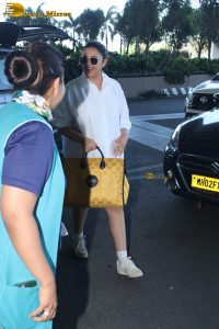 actress Parineeti Chopra in a short white dress at mumbai airport