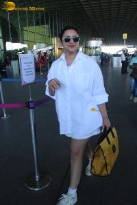 actress Parineeti Chopra in a short white dress at mumbai airport