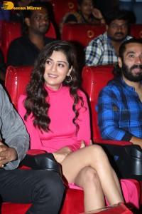 Actress Payal Rajput in a pink dress while attending the teaser launch of the Telugu film Ginna