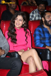 Actress Payal Rajput in a pink dress while attending the teaser launch of the Telugu film Ginna
