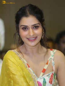 actress Payal Rajput in a white and yellow lehenga choli