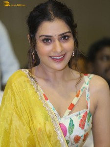 actress Payal Rajput in a white and yellow lehenga choli