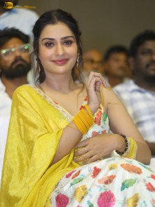 actress Payal Rajput in a white and yellow lehenga choli
