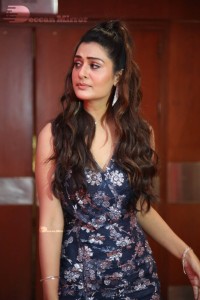 Actress Payal Rajput in a blue dress