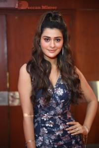 Actress Payal Rajput in a blue dress
