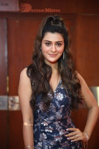 Actress Payal Rajput in a blue dress