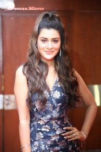 Actress Payal Rajput in a blue dress