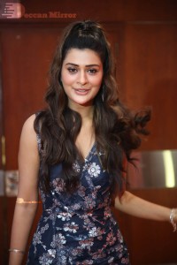 Actress Payal Rajput in a blue dress