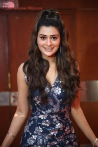 Actress Payal Rajput in a blue dress